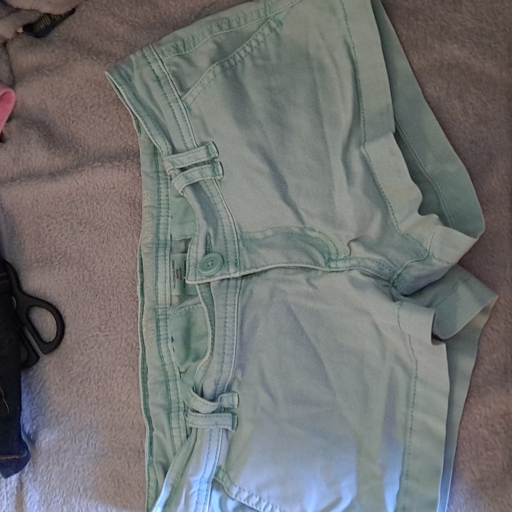Light blue teal low-rise stretch shorts Mossimo size 0 25
